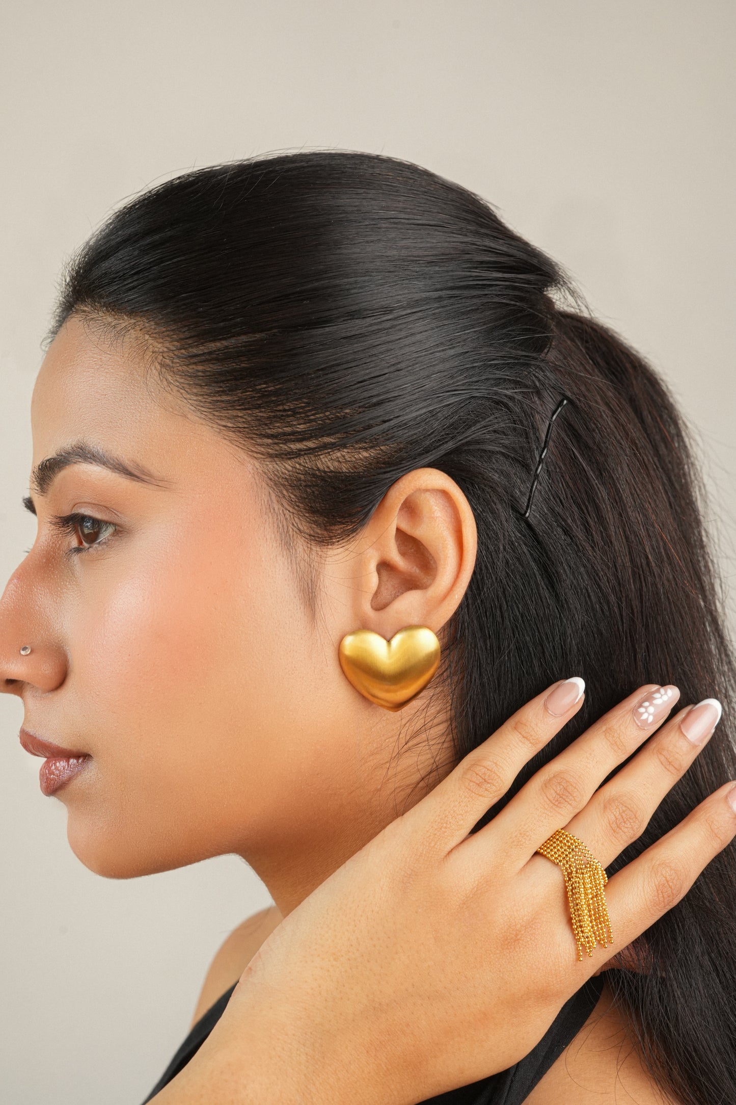 The Venice heart studs