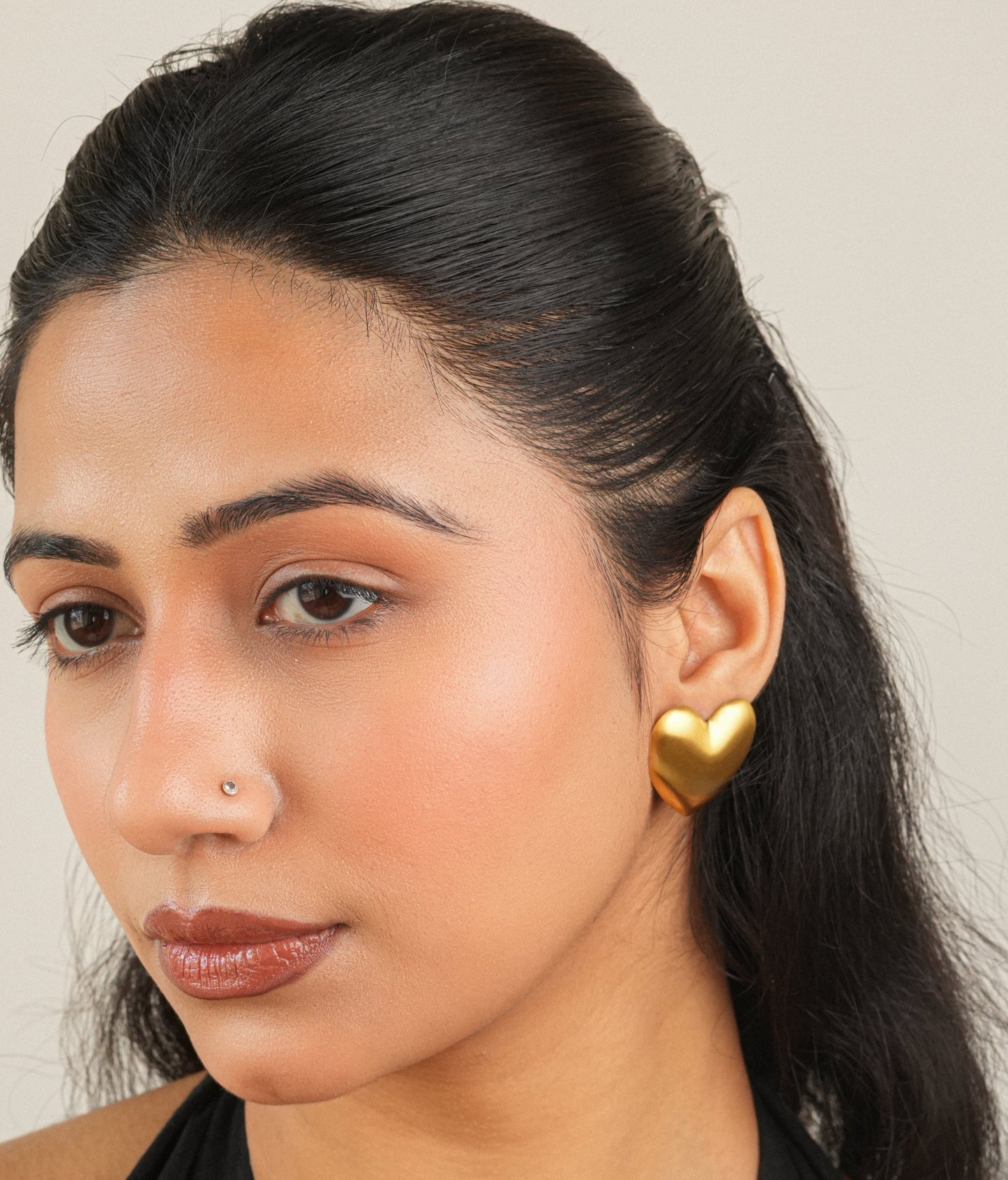 The Venice heart studs