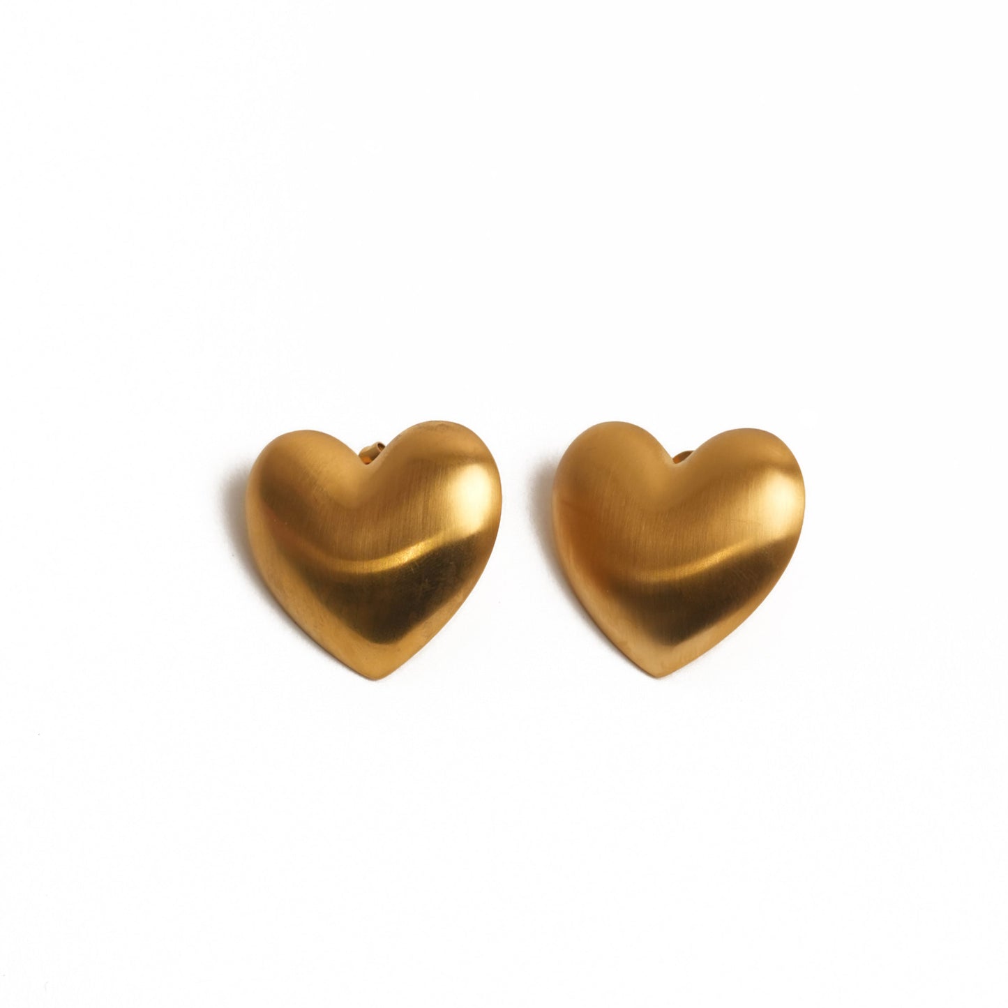 The Venice heart studs